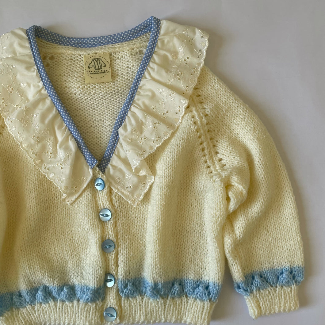 2-3 years - Cream frilly cardigan with blue trim