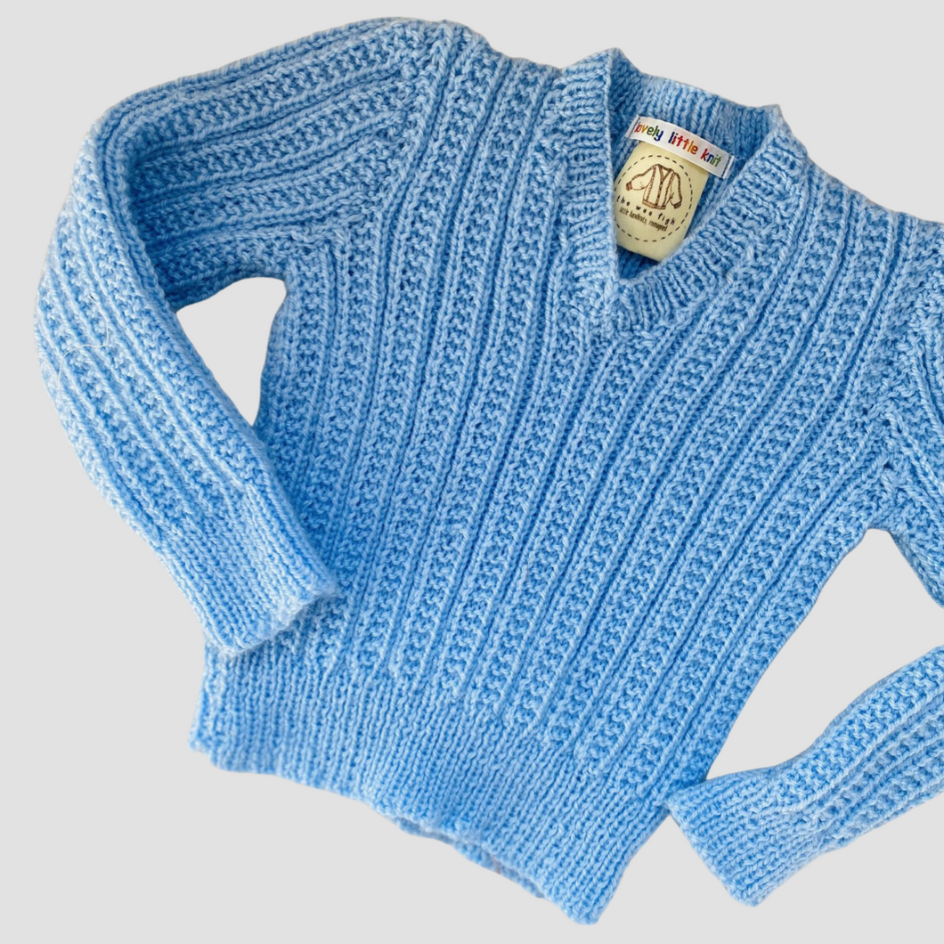 06-12 months - Pastel blue jumper