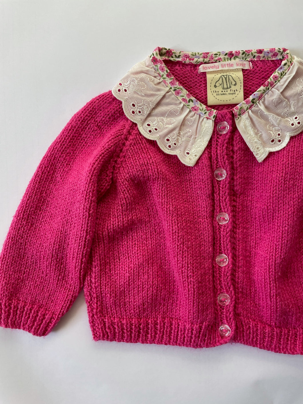 06-12 months - Pink frilly cardigan